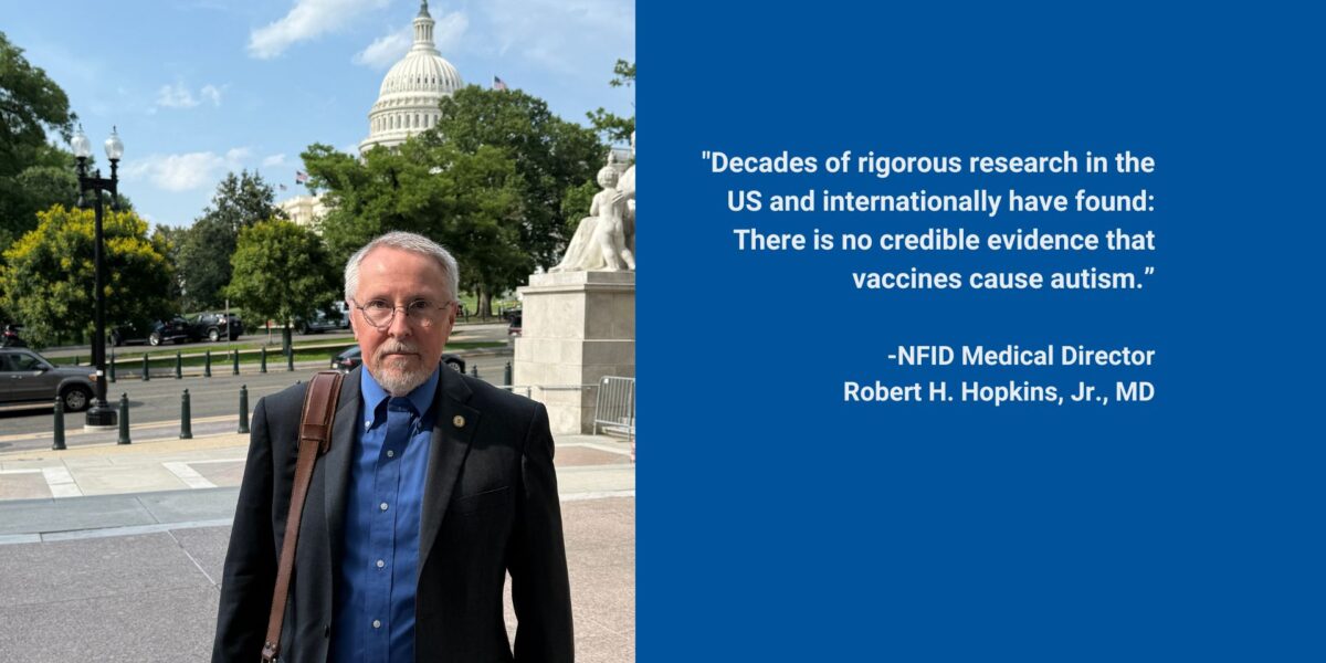 A man with a stern look stands outside the Capitol building with quote on vaccine safety and autism.